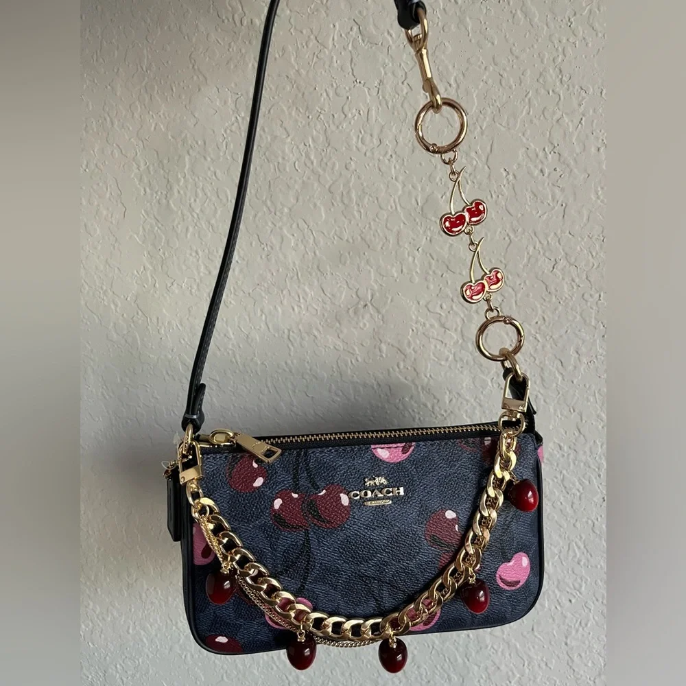 Nolita 19 in Signature Canvas with Cherry Print and Handmade Cherry Charm - Picture 1 of 12